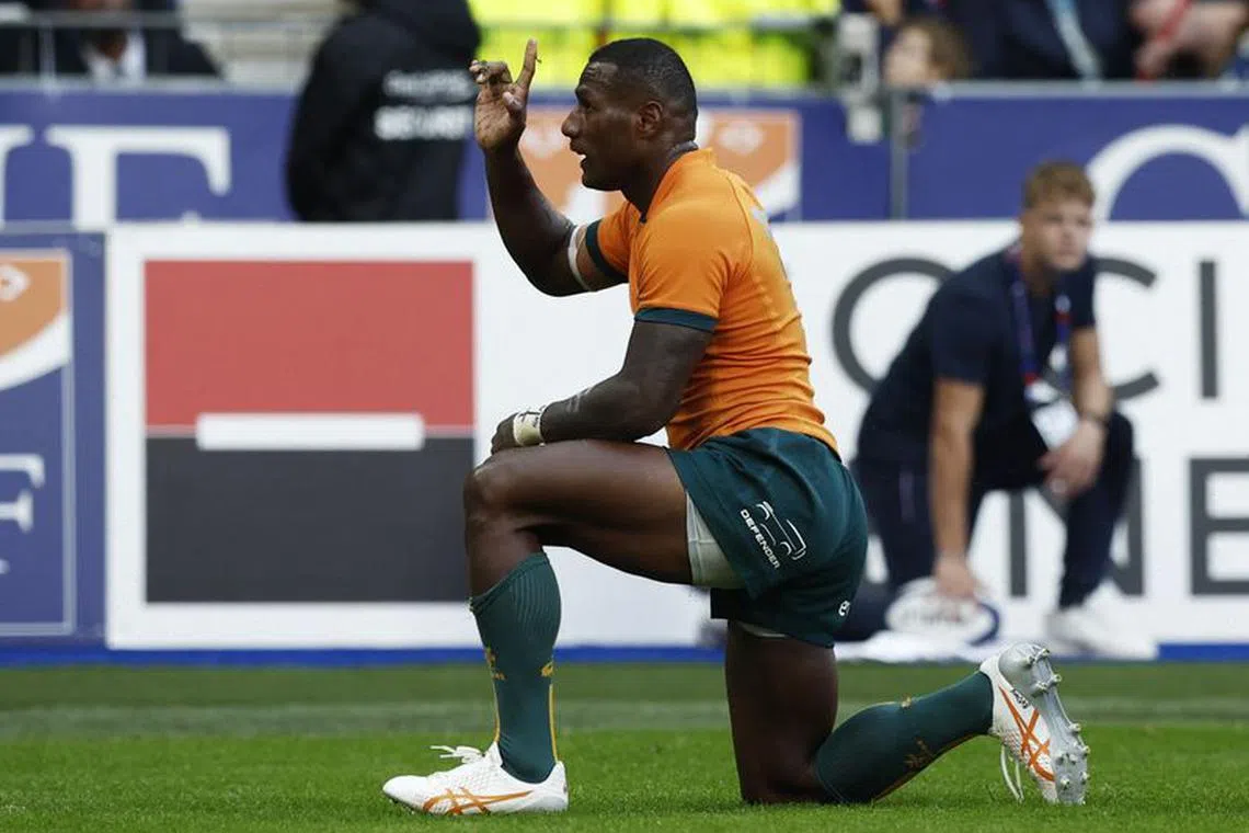 FILE PHOTO: Rugby Union - France v Australia - World Cup Warm Up - Stade de France, Saint-Denis, France - August 27, 2023 Australia's Suliasi Vunivalu celebrates scoring their third try REUTERS/Benoit Tessier/file photo