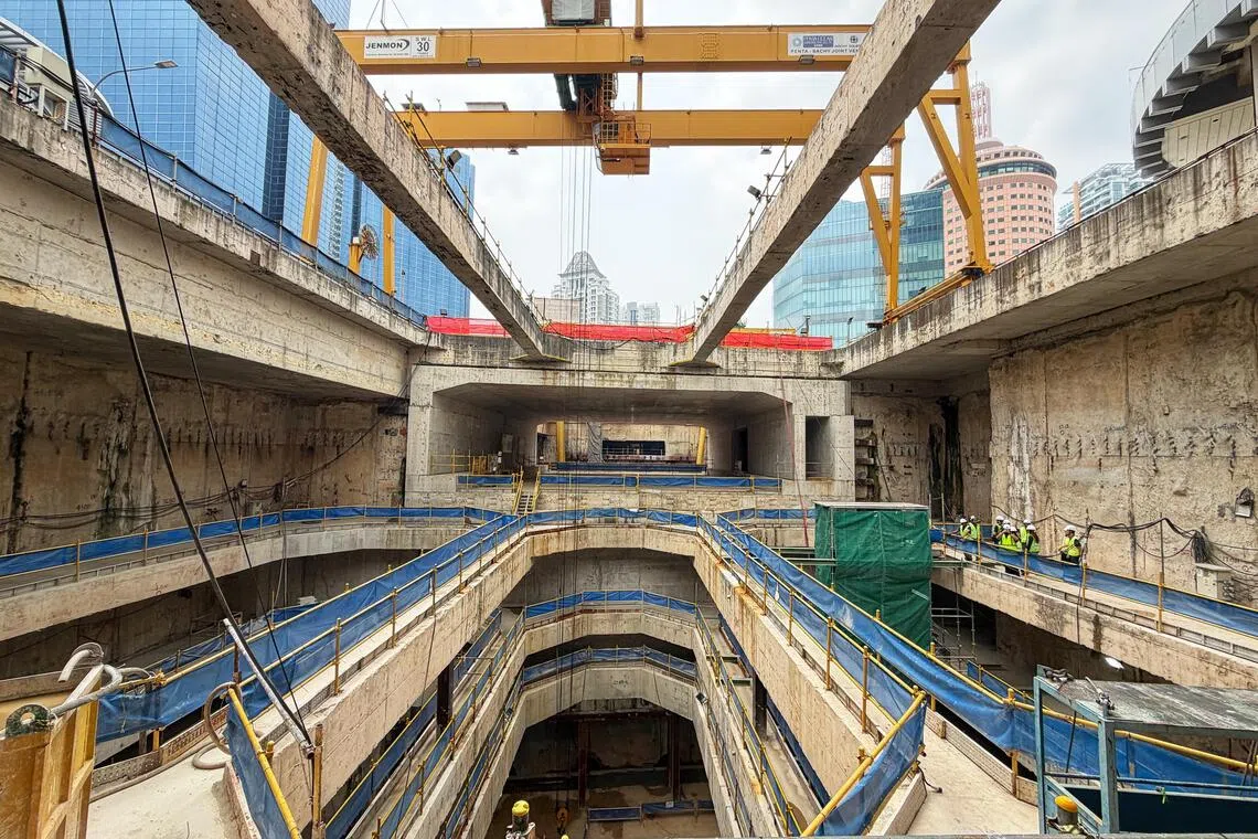The North-South Corridor’s southbound tunnel (top) over-crossing and northbound tunnel (bottom) under-crossing the North-South MRT line at the Novena work site on Sept 15.