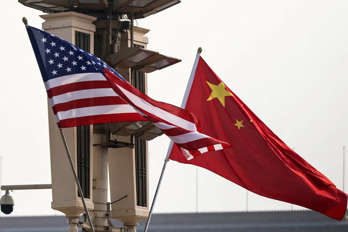 FILE PHOTO: U.S. and China’s national flags flutter in Tiananmen Square, ahead of U.S. President Donald Trump's visit to China, in Beijing, China, May 13, 2026. REUTERS/Maxim Shemetov/File Photo