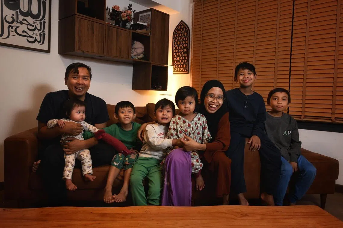 Amirudin Mohd Zain, 39, and his wife, Aszafirah Abu, 37, and their children on May 21.