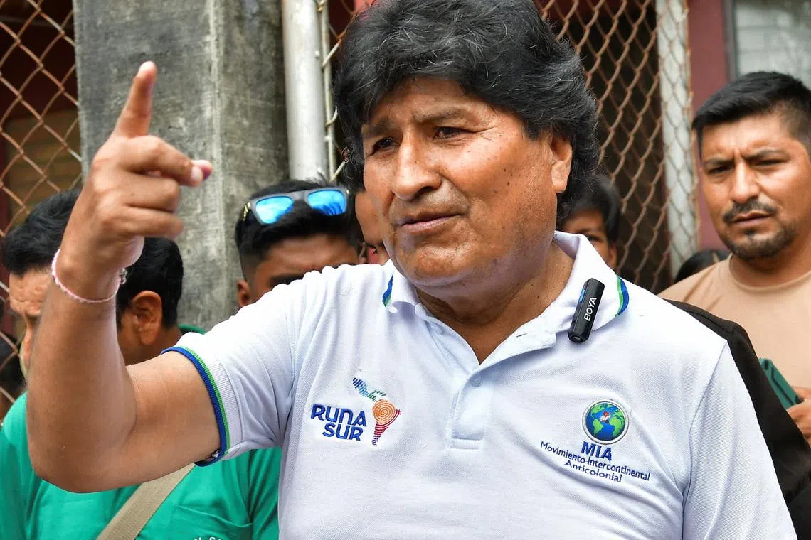 Former Bolivian President Evo Morales gestures as he leaves after casting his ballot, at a polling station during the presidential runoff election, in Cochabamba, Bolivia October 19, 2025. REUTERS/Patricia Pinto