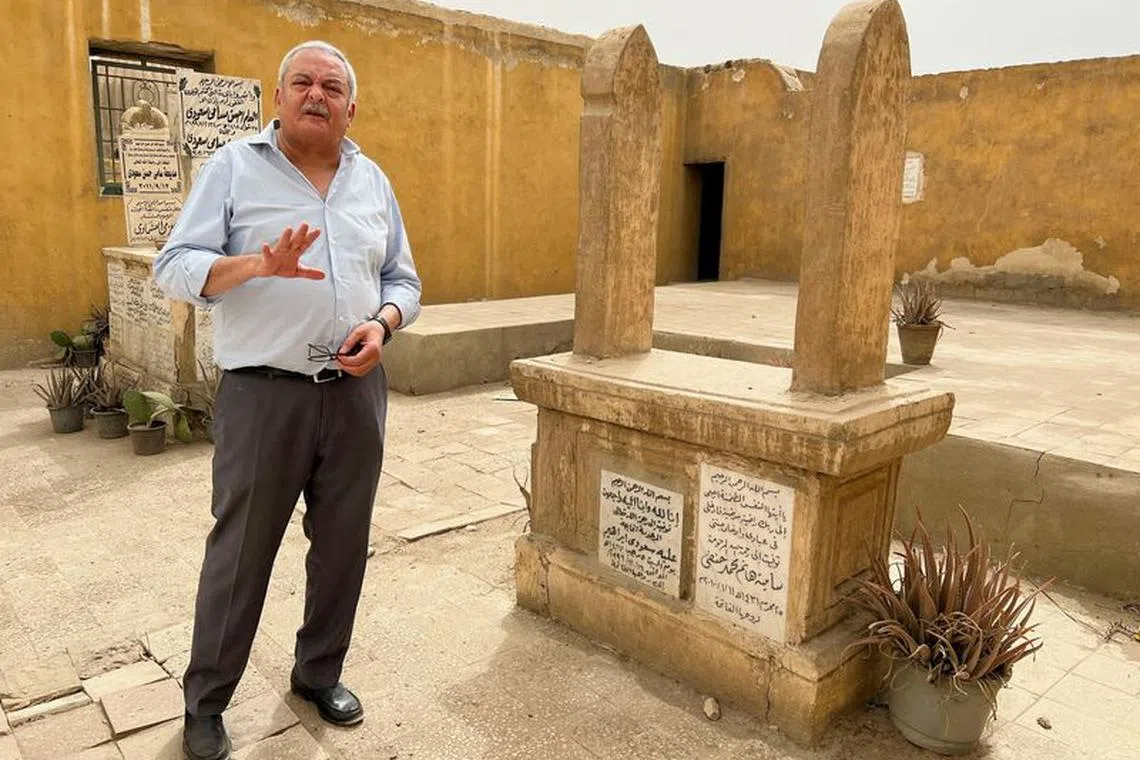 FILE PHOTO: Hisham Kassem, a former newspaper publisher and political activist, speaks during an interview with Reuters TV at his family's cemetery, which is planned to be demolished, across The City of the Dead, where a new construction project is underway on the Salah Salem road, in the capital city of Cairo, Egypt, June 13, 2023. REUTERS/Ahmed Fahmy/File Photo