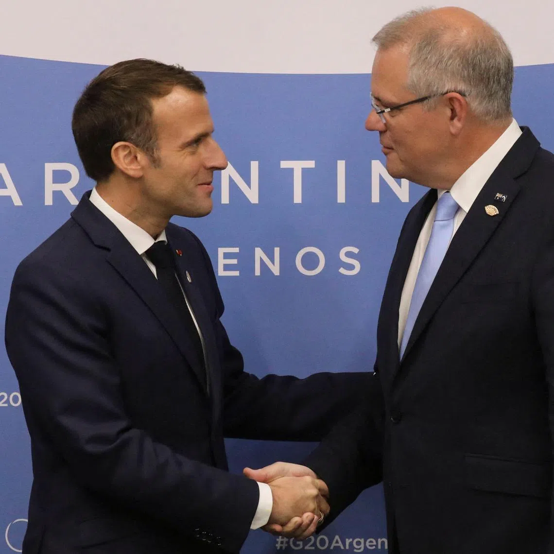 Mr Scott Morrison (right) revealed new details of how he kept French President Emmanuel Macron in the dark about Australia's nuclear submarine deal with the US and UK.