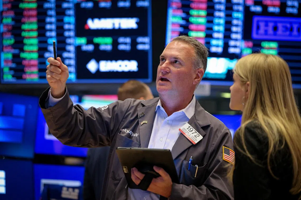 Traders working on the floor of the New York Stock Exchange, in New York City, on May 14.    