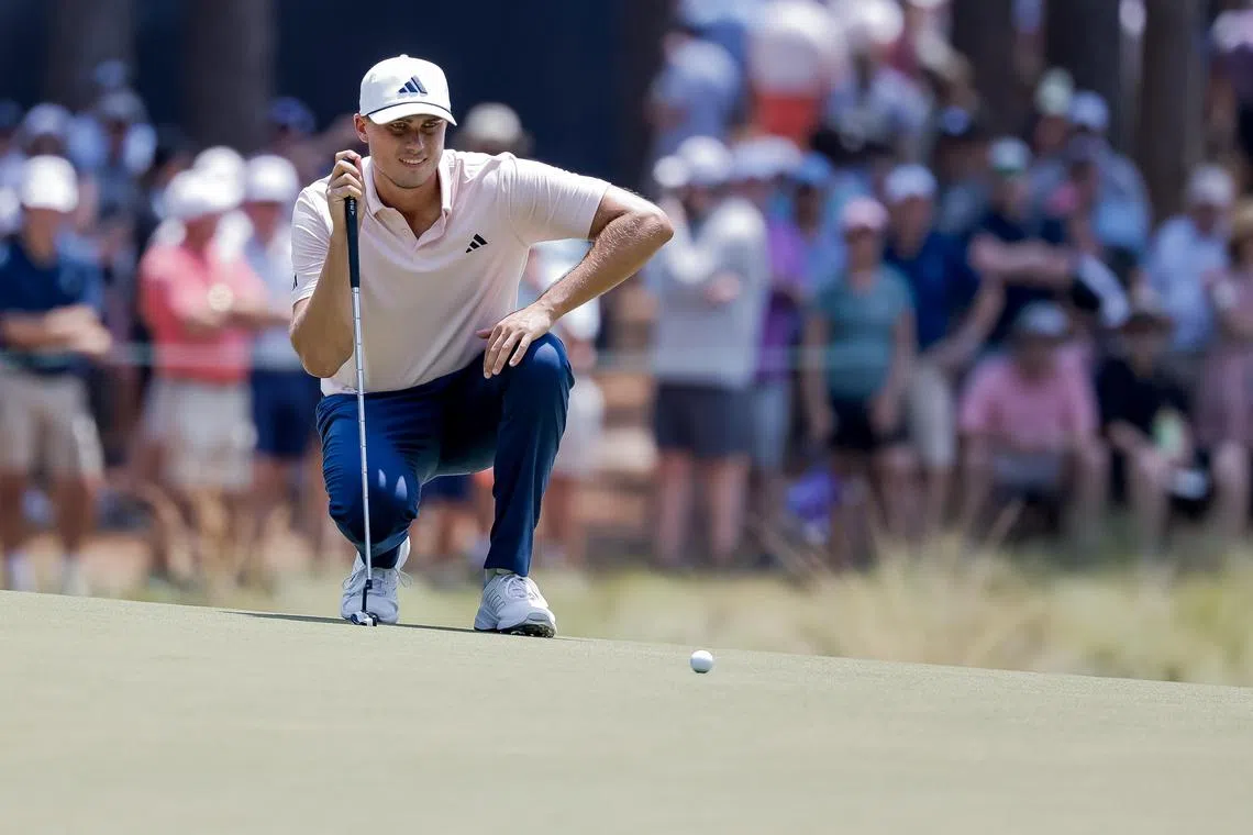 Sweden's Ludvig Aberg lines up a putt on the second green during the second round of the US Open.