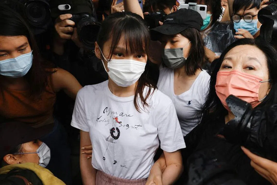 FILE PHOTO: Pro-democracy activist Agnes Chow releases from prison after serving nearly seven months for her role in an unauthorised assembly during the city's 2019 anti-government protests, in Hong Kong, China June 12, 2021. REUTERS/Tyrone Siu/File Photo
