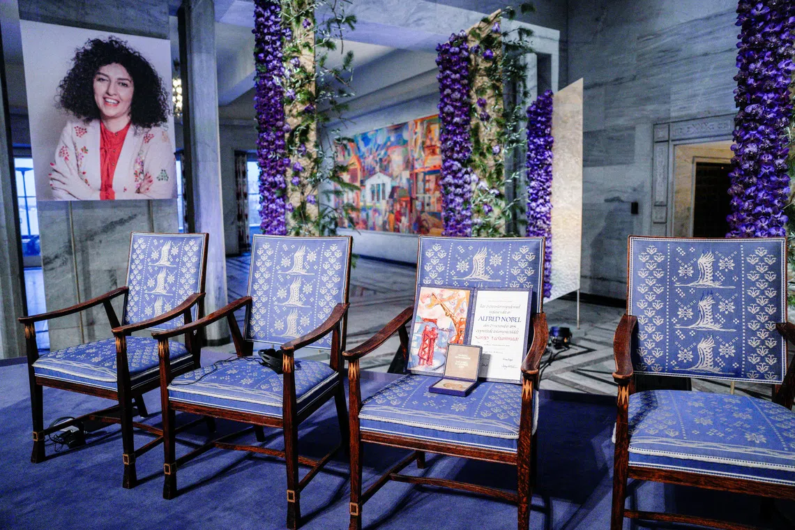 An empty space showing that Nobel Peace Prize winner Narges Mohammadi was not present during the award ceremony at Oslo City Hall, Norway December 10, 2023. NTB/Javad Parsa via REUTERS