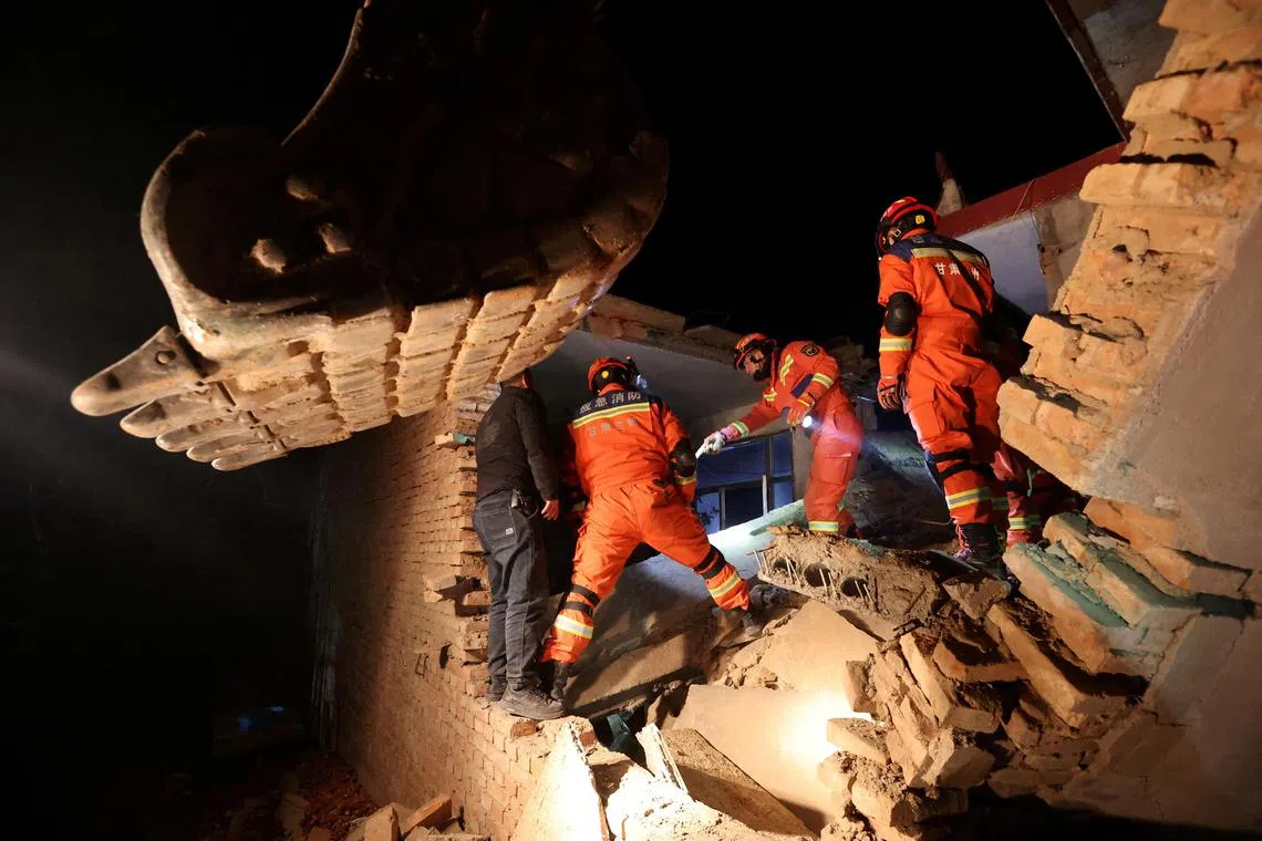 Rescue workers conducting search and rescue operations at Kangdiao village following the earthquake in Jishishan Gansu province, China on Dec 19.