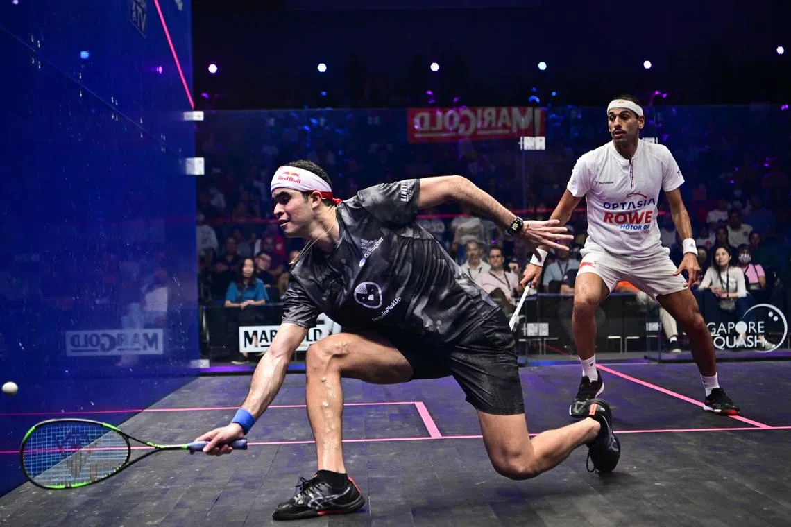 Peru's Diego Elias (in black) lost the men's final of the 2022 Singapore Squash Open to Mohamed El Shorbagy (white) and returns for this year's edition.