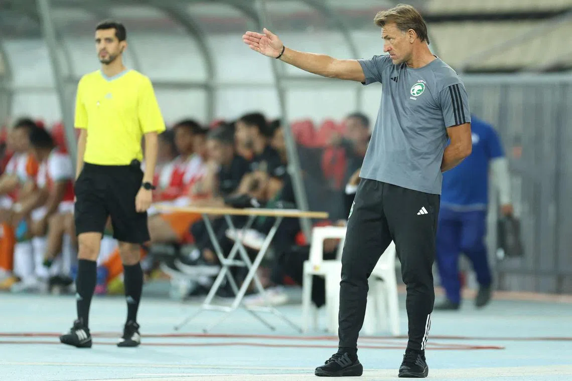 Saudi Arabia coach Herve Renard speaking to his players during a friendly football match against Bolivia at the Prince Abdullah al-Faisal Stadium in Jeddah.