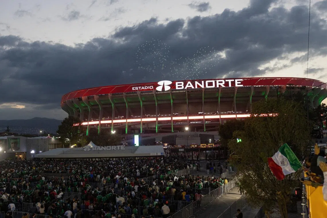 Fans line up outside Azteca Stadium, officially renamed Estadio Banorte, on the day of a friendly match between the national teams of Mexico and Portugal held to mark the stadium's inauguration, as Mexico prepares for the 2026 FIFA World Cup co-hosted by the United States, Canada and Mexico, in Mexico City, Mexico, March 28, 2026. REUTERS/Quetzalli Nicte-Ha
