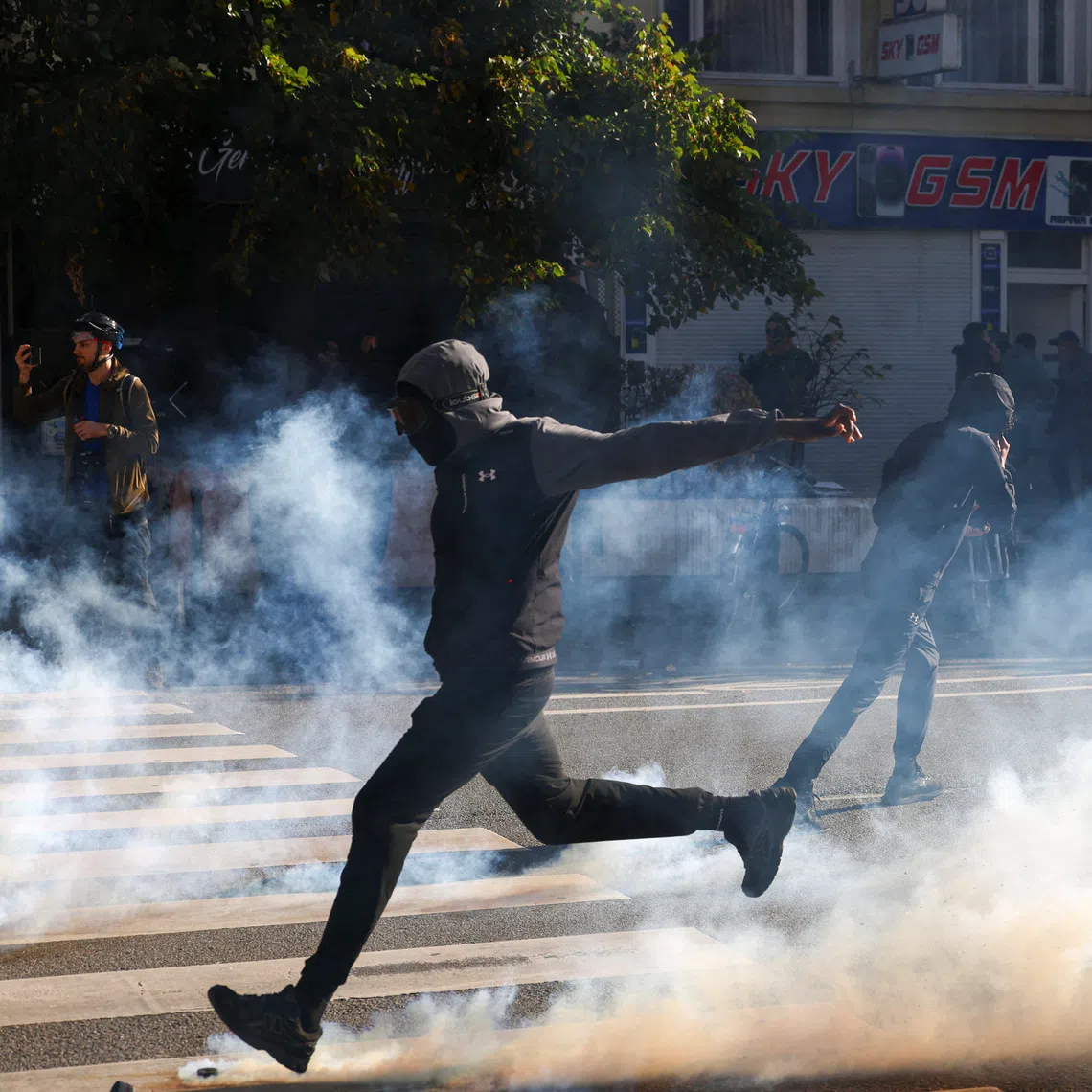 A demonstrator during a student protest in Brussels, Belgium, on Oct 17.