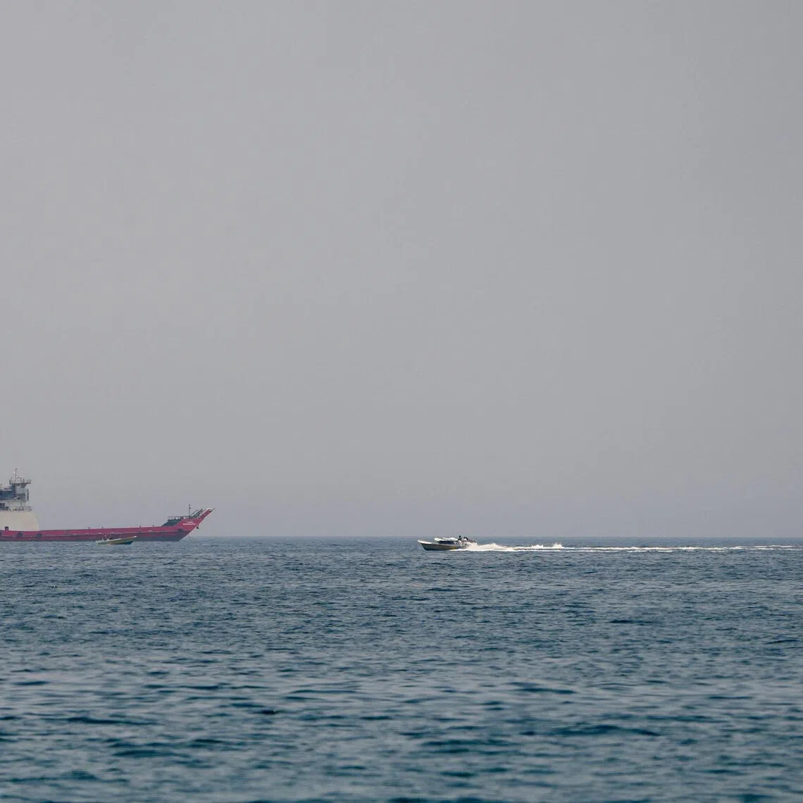 Vessels in the Strait of Hormuz, as seen from Musandam, Oman, July 29, 2026. REUTERS/Stringer REFILE - QUALITY REPEAT