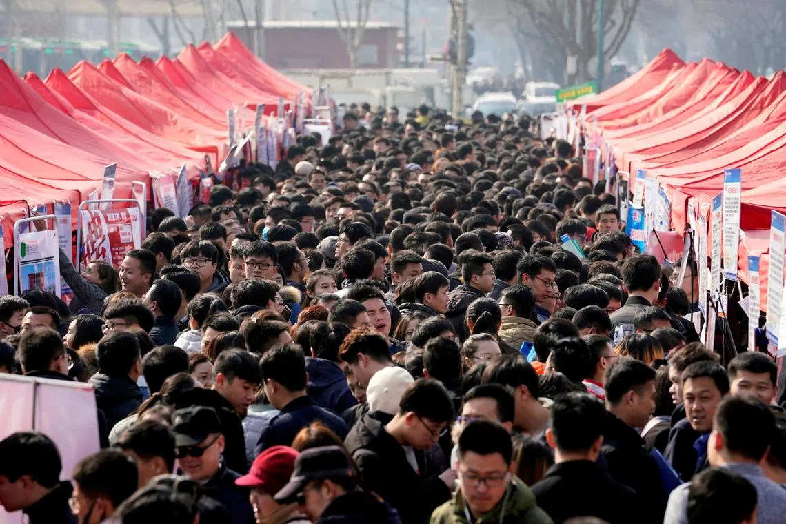 Job fair, Shijiazhuang, February 25, 2018. REUTERS/Jason Lee