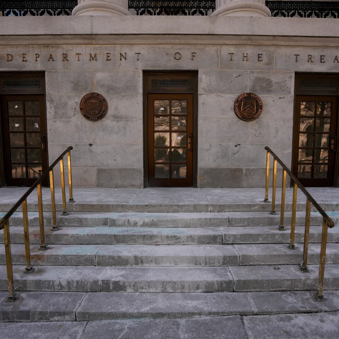 FILE PHOTO: A general view of the entrance to the U.S. Department Of The Treasury, in Washington, D.C., U.S., February 1, 2026. REUTERS/Ken Cedeno/File Photo