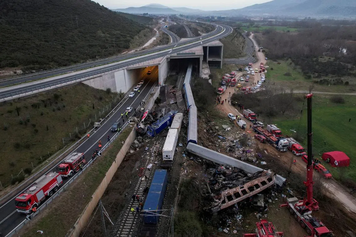 FILE PHOTO: Rescue crews operate at the site of a crash, where two trains collided, near the city of Larissa, Greece, March 1, 2023. REUTERS/Alexandros Avramidis/File Photo
