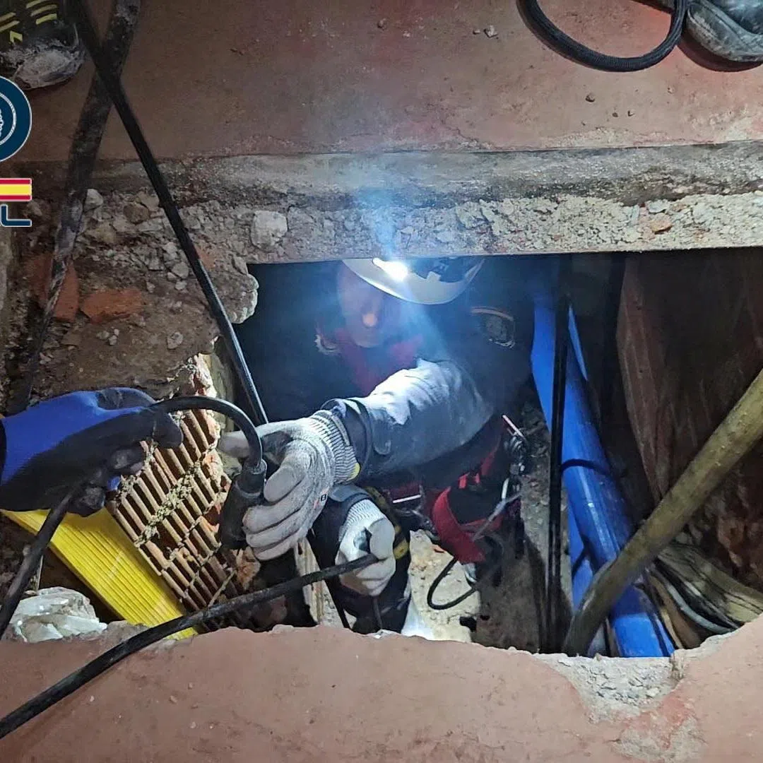 A person works inside a tunnel that was used to bring tons of hashish from Morrocco into Spain, in Ceuta, Spain, in an undated picture released on March 31, 2026. Spanish Police/Handout via REUTERS