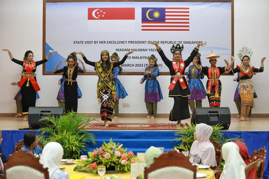 Dancers perform during President Halimah Yacob’s visit at Wisma Pandu Puteri, on March 21, 2023. 