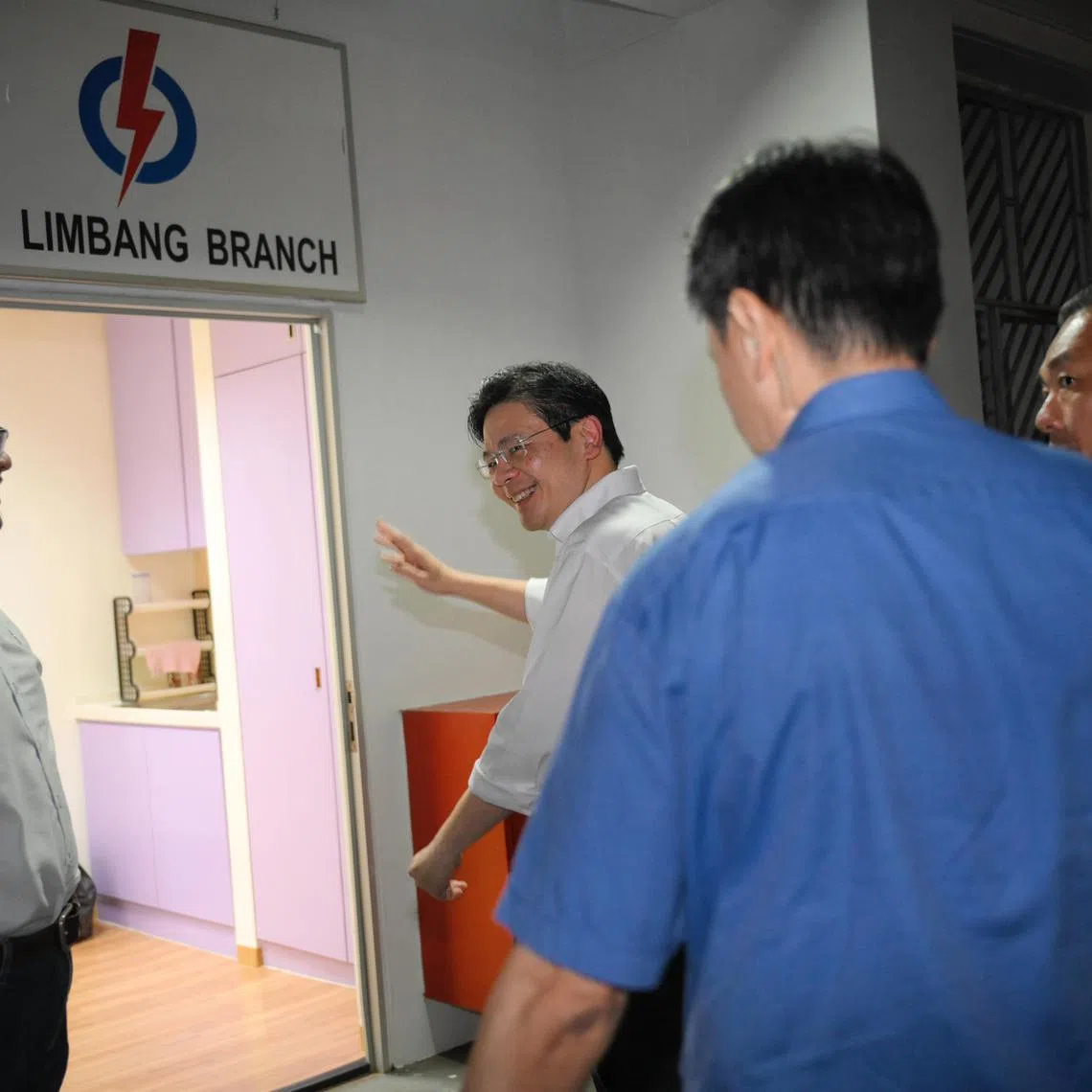 Deputy Prime Minister Lawrence Wong waves as he arrives at the PAP Limbang Branch for a Meet-the-People session at Block 787 Choa Chu Kang North 6 on April 15, 2024.