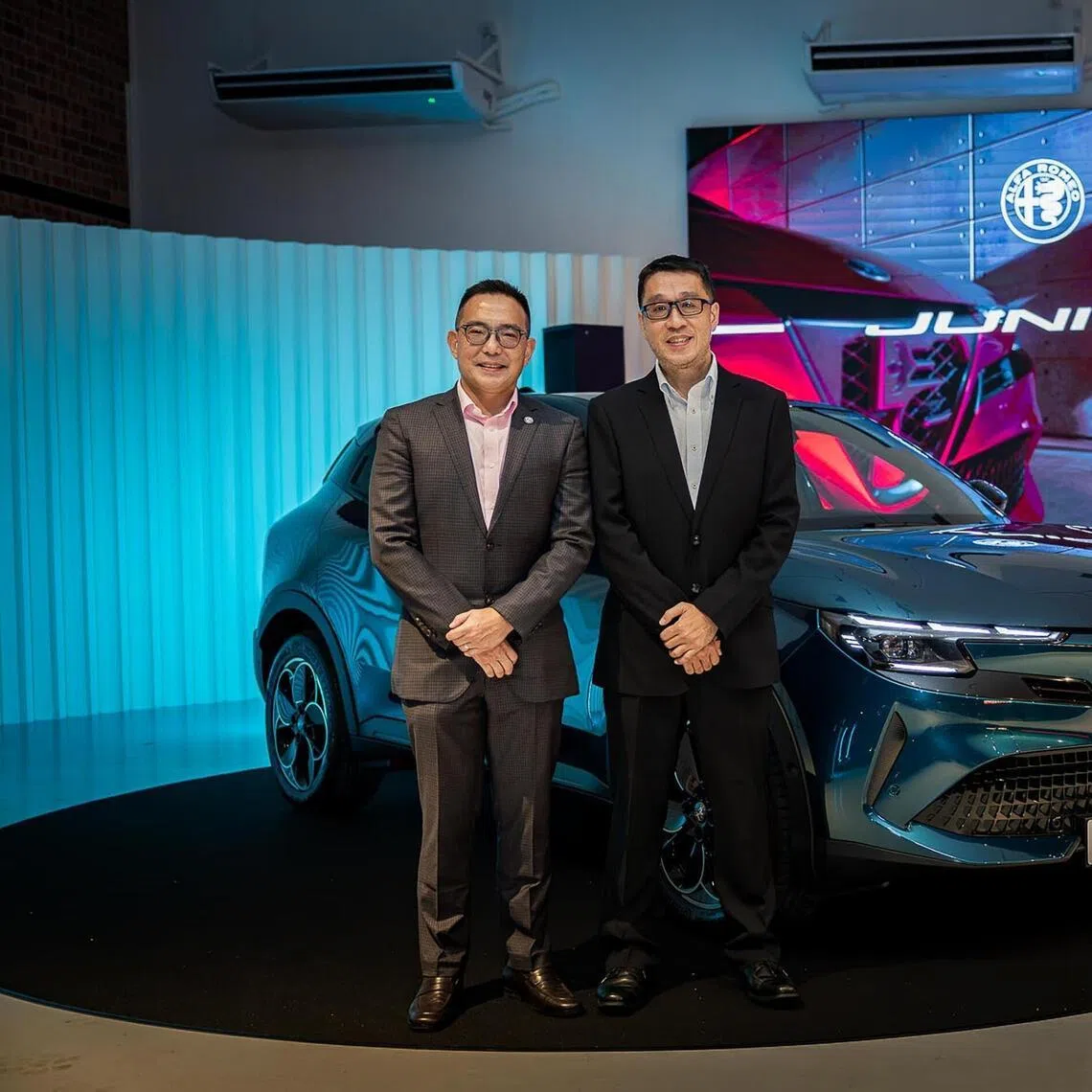 The Alfa Romeo Junior Elettrica at the media preview on April 10 with Mr Eric Khoo, Head of Market Development, Stellantis ASEAN (left), and Mr William Tan, General Manager, Red Rock & Rosso Motor