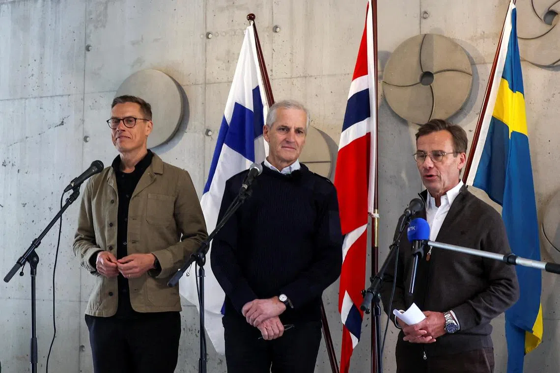 (From left) Finnish President Alexander Stubb, Norwegian Prime Minister Jonas Gahr Store and Swedish Prime Minister Ulf Kristersson, addressing the media during a visit to the Norwegian Armed Forces' operational headquarters in Bodo, Norway, on June 20.