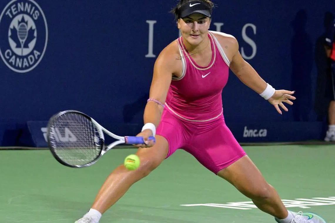 FILE PHOTO: Aug 8, 2023; Montreal, Quebec, Canada; Bianca Andreescu (CAN) hits a forehand against Camila Giorgi (ITA) (not pictured) during first round play at IGA Stadium. Mandatory Credit: Eric Bolte-USA TODAY Sports/File Photo