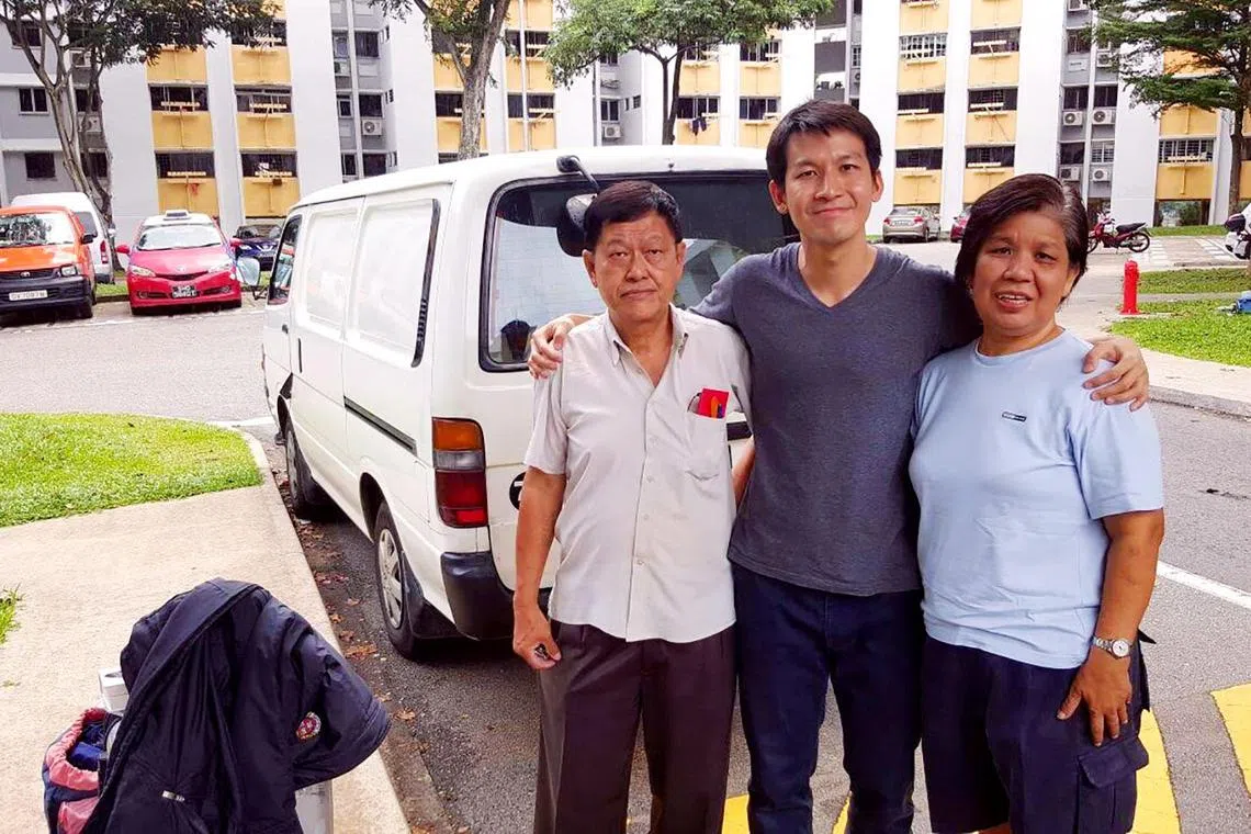 Mr Desmond Lim, co-founder of Workstream, and his parents, together with the van (behind them) that his father had driven for 30 years. Mr Lim's father is a driver, while his mother is a cleaner. 