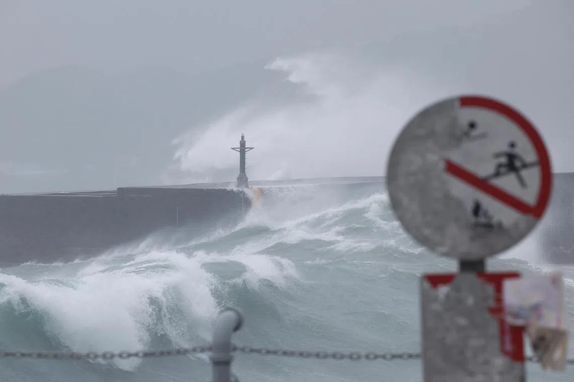 Waves break against the protecting walls as Typhoon Gaemi approaches in Keelung, Taiwan on July 24, 2024.