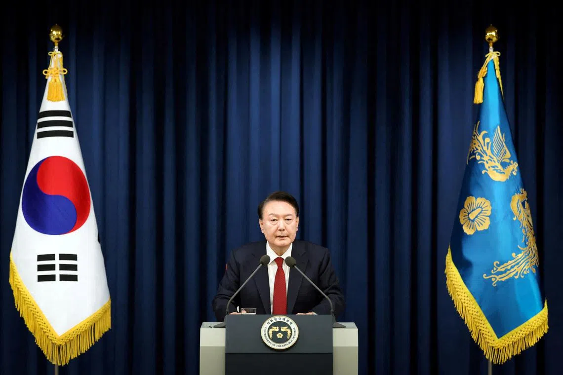 South Korean President Yoon Suk Yeol  delivers a speech to declare martial law in Seoul, South Korea, December 3, 2024. The Presidential Office/Handout via REUTERS