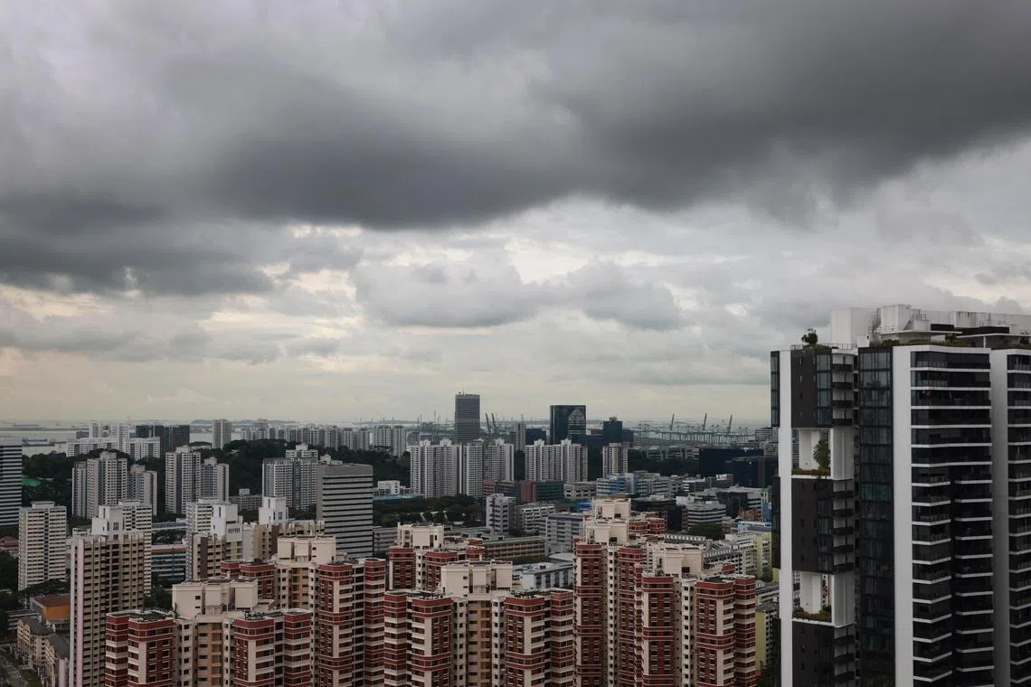 Dark clouds over HDB public housing flats in southern Singapore on Dec 22, 2022. 