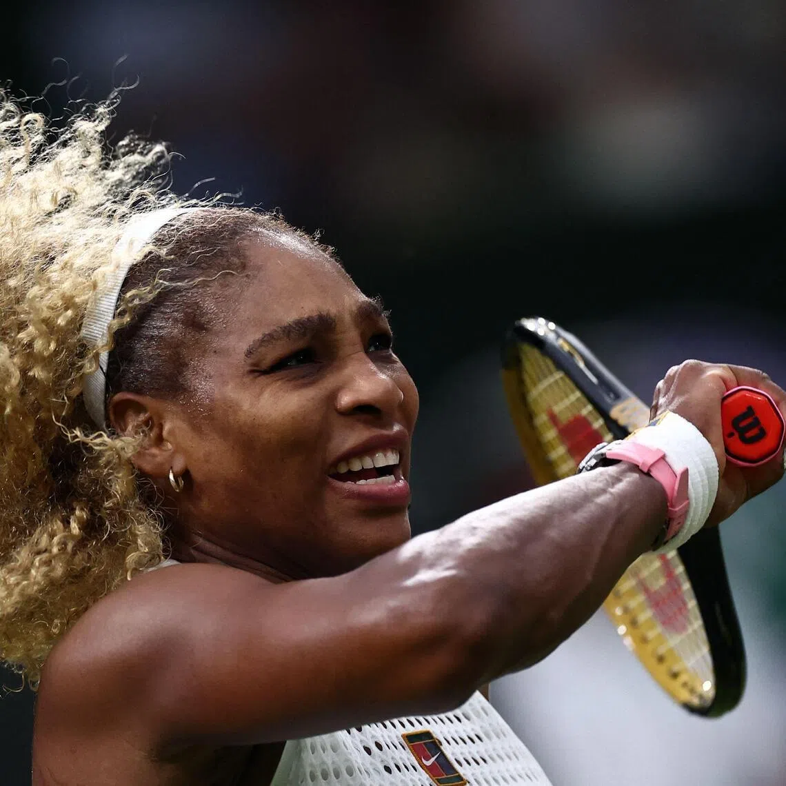 US player Serena Williams returns the ball to Australia's Maya Joint during their women's singles first round tennis match on the second day of the 2026 Wimbledon Championships at The All England Lawn Tennis and Croquet Club in Wimbledon, southwest London, on June 30, 2026. (Photo by HENRY NICHOLLS / AFP) / RESTRICTED TO EDITORIAL USE