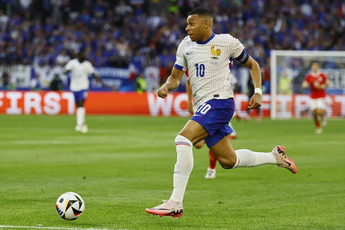 Soccer Football - Euro 2024 - Group D - Austria v France - Dusseldorf Arena, Dusseldorf, Germany - June 17, 2024 France's Kylian Mbappe in action REUTERS/Wolfgang Rattay/File Photo