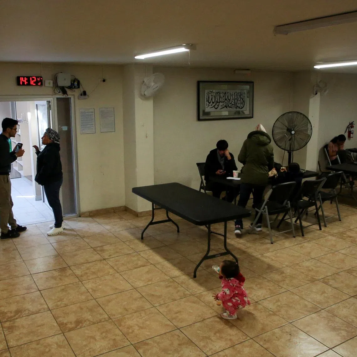 FILE PHOTO: Muslim migrants stranded after U.S. President Donald Trump cancelled all U.S. asylum appointments for migrants waiting in Mexico are seen at the Assabil shelter, the only such refuge in Mexico specifically for Muslim migrants, in Tijuana, Mexico January 21, 2025. REUTERS/Jorge Duenes/File Photo