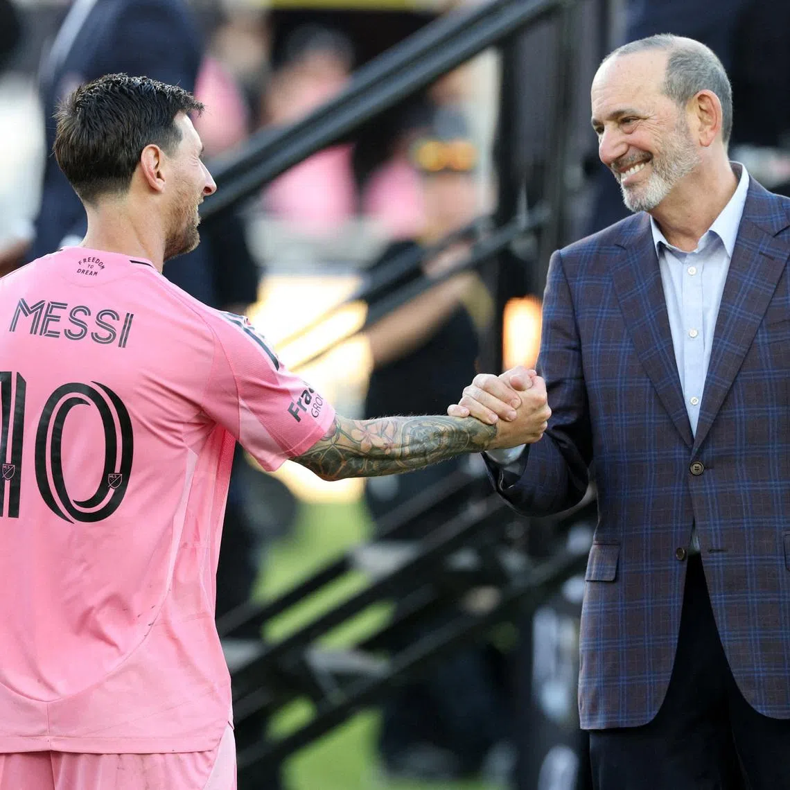 FILE PHOTO: Dec 6, 2025; Fort Lauderdale, Florida, USA; Inter Miami forward Lionel Messi (10) shakes hands with MLS commissioner Don Garber after winning the 2025 MLS Cup against the Vancouver Whitecaps FC at Chase Stadium. Mandatory Credit: Nathan Ray Seebeck-Imagn Images/File Photo