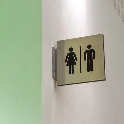 Women's toilet capacity at stations remains at only about 60 per cent of that for men.