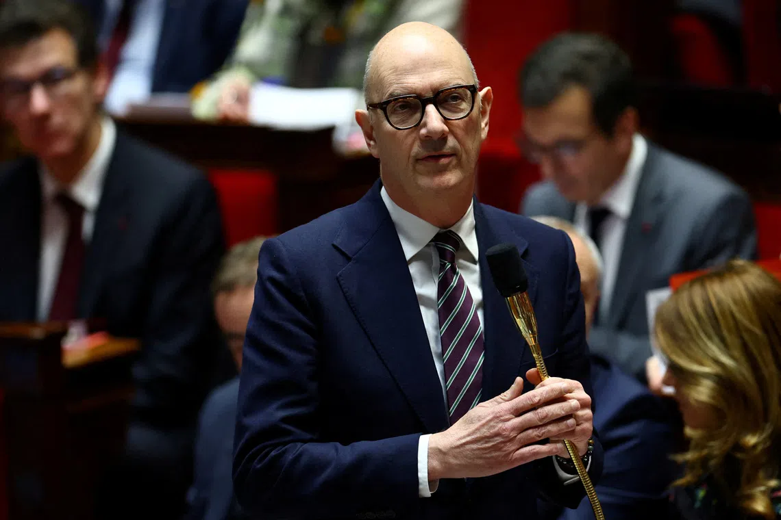 FILE PHOTO: French Economy Minister Roland Lescure speaks during the questions to the government session at the National Assembly in Paris, France, December 9, 2025. REUTERS/Sarah Meyssonnier/File Photo