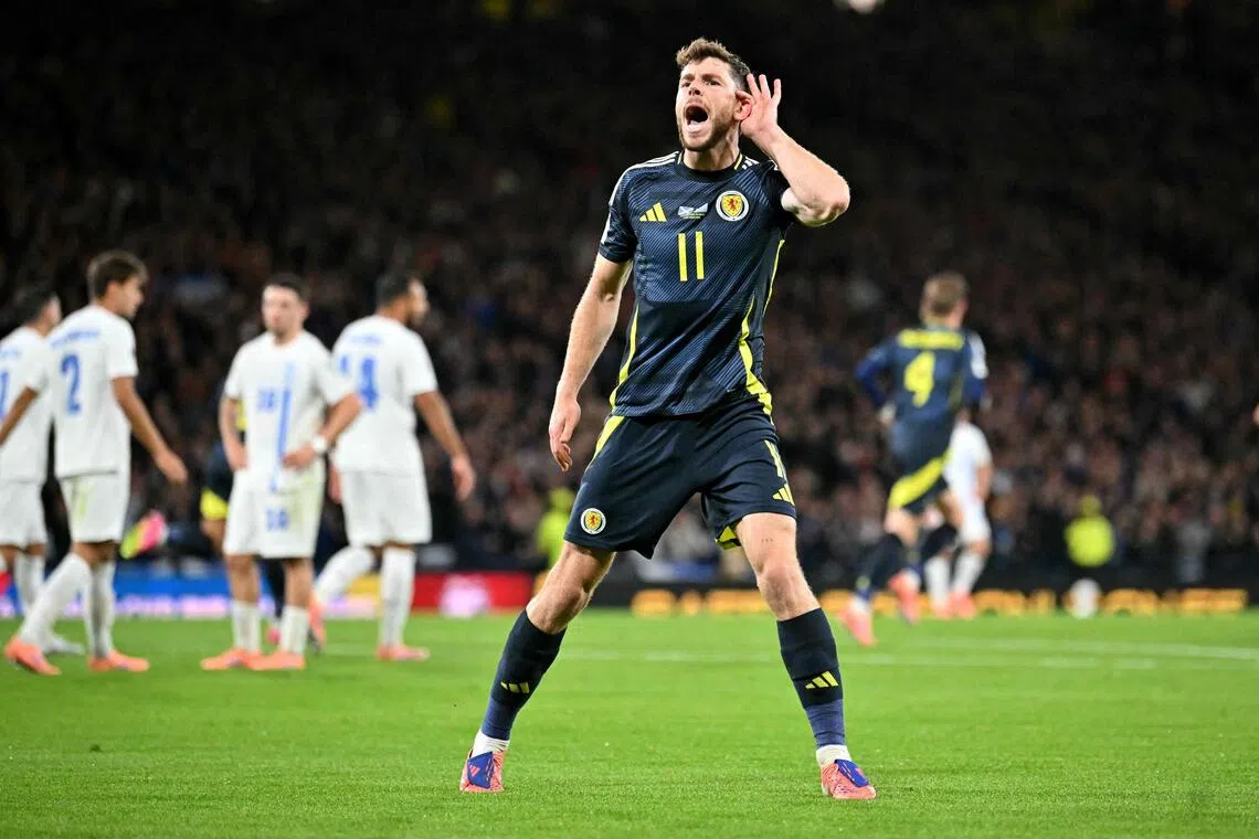 Scotland striker Ryan Christie celebrates scoring the team's first goal in the 3-1 win over Greece.