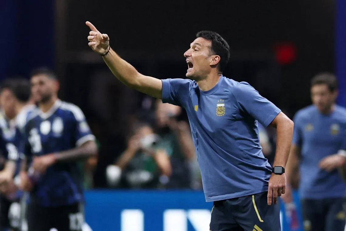 Soccer Football - FIFA World Cup 2026 - Semi Final - England v Argentina - Atlanta Stadium, Atlanta, Georgia, U.S. - July 15, 2026 Argentina coach Lionel Scaloni celebrates after Lautaro Martinez scores their second goal REUTERS/Paul Childs
