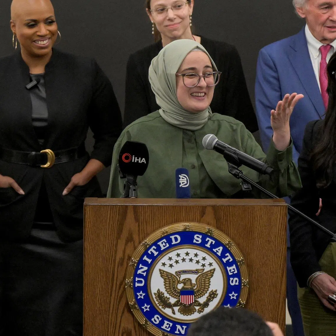 FILE PHOTO: Tufts University student Rumeysa Ozturk, of Turkey, speaks at a press conference at Boston Logan International Airport after she was released on a judge's order after spending over six weeks in an immigration detention center in Louisiana, in Boston, Massachusetts, U.S. May 10, 2025.  REUTERS/Faith Ninvaggi/File Photo