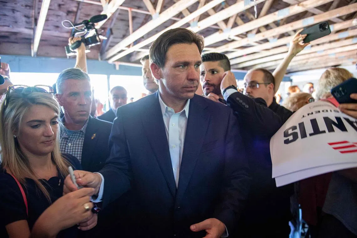 Florida Governor and 2024 presidential hopeful Ron DeSantis greets supporters during a campaign stop in Salem, New Hampshire.