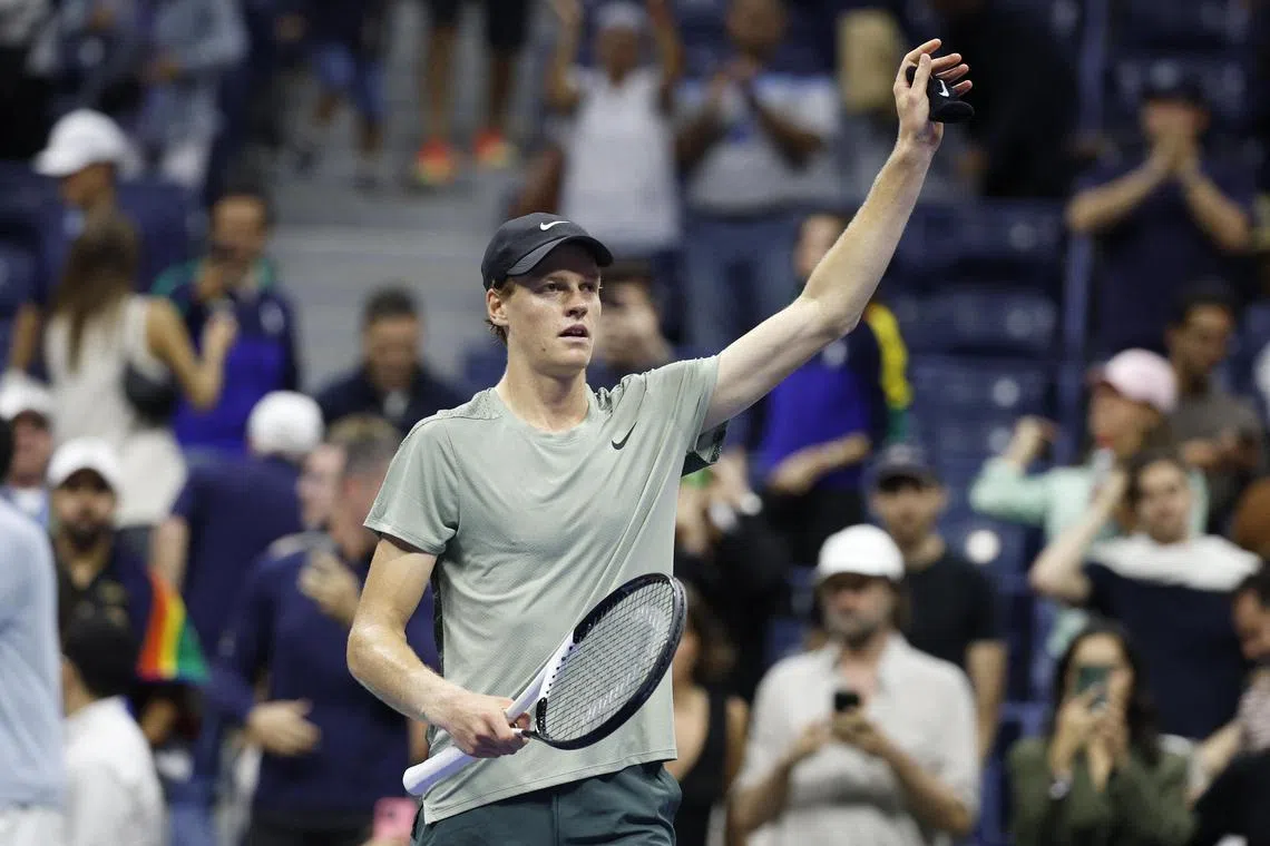 Jannik Sinner acknowledging the crowd after beating Tommy Paul at the US Open. The Italian will next face Daniil Medvedev in the quarter-finals.