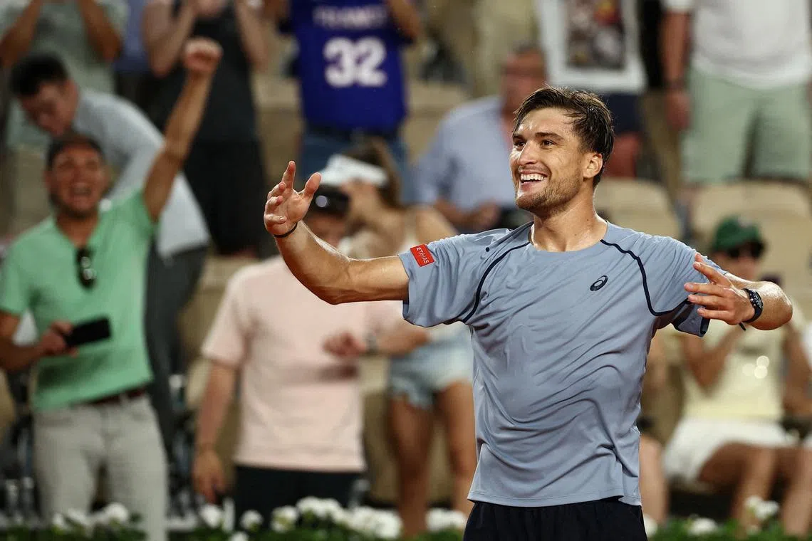 Tennis - French Open - Roland Garros, Paris, France - May 28, 2026 Belgium's Raphael Collignon celebrates after winning his second round match against Ben Shelton of the U.S. REUTERS/Guglielmo Mangiapane