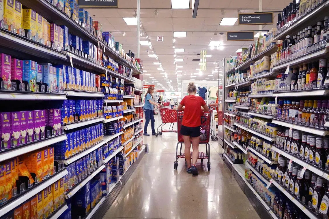 CHICAGO, ILLINOIS - AUGUST 16: Customers shop at a Target store on August 16, 2023 in Chicago, Illinois. Target’s quarterly sales fell for the first time in six years which is being attributed in part to consumer backlash from the sale of Pride Month merchandise.   Scott Olson/Getty Images/AFP (Photo by SCOTT OLSON / GETTY IMAGES NORTH AMERICA / Getty Images via AFP)