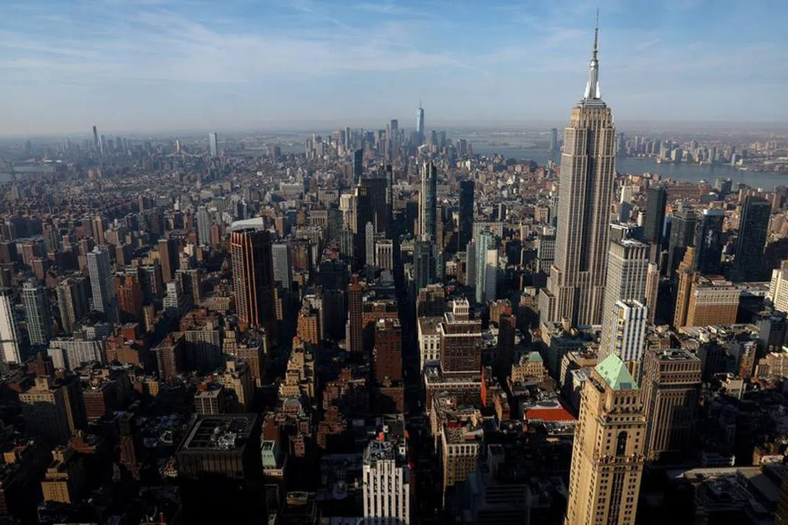 The Empire State Building and Manhattan skyline are pictured from the Summit at One Vanderbilt observatory in Manhattan in New York City, U.S., April 14, 2023. REUTERS/Mike Segar/File Photo