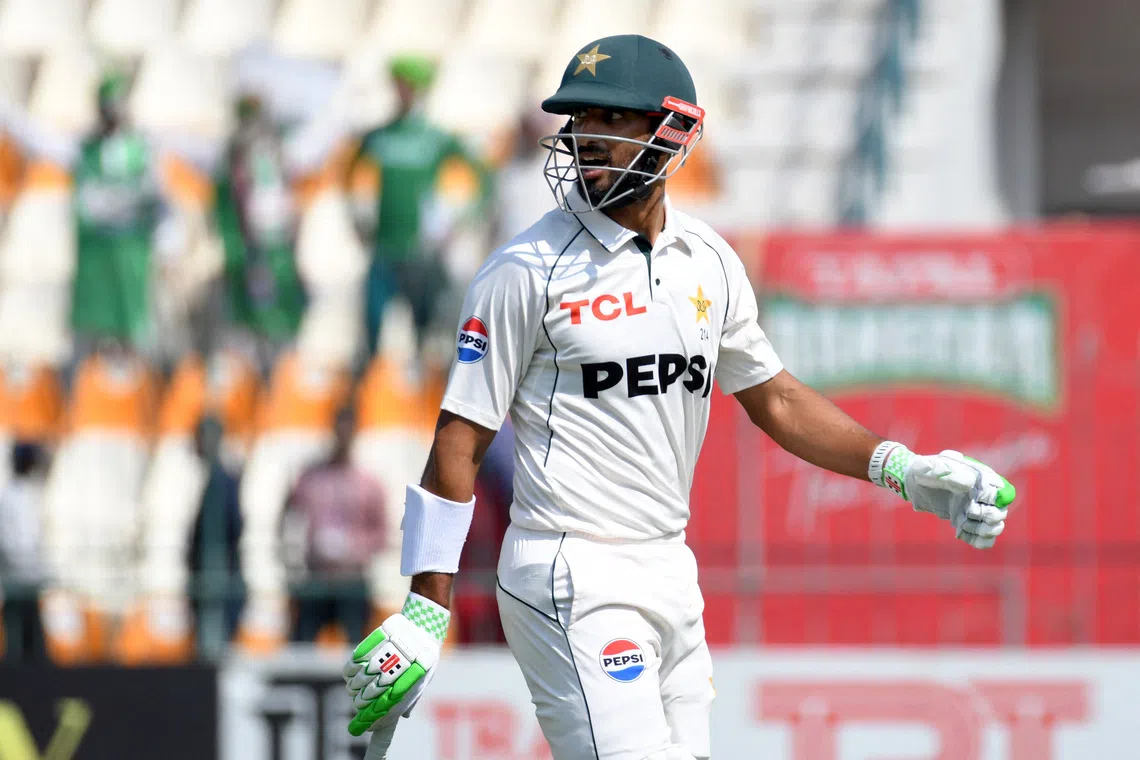 FILE PHOTO: Cricket - Second Test - England v Pakistan - Multan Cricket Stadium, Multan, Pakistan - October 17, 2024 Pakistan's Shan Masood walks back to the pavilion after losing his wicket, caught out by England's Ollie Pope off the bowling of Shoaib Bashir REUTERS/M A Tanveer/File Photo