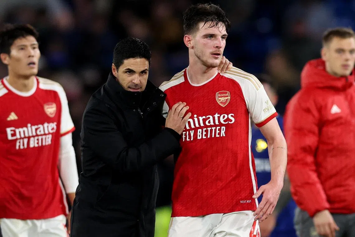 Arsenal manager Mikel Arteta and midfielder Declan Rice following the 2-2 Premier League draw with Chelsea.