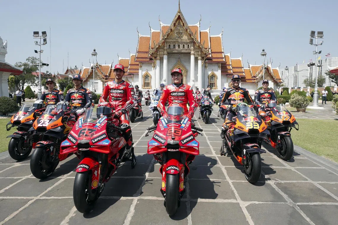 Riders sitting on their bikes for a photoshoot during the MotoGP 2025 Launch event at Wat Benchamabophit, also known as the Marble Temple, in Bangkok, Thailand, on Feb 9, 2025. The MotoGP 2025 season launch event is set to promote the start of the Motorcycling Grand Prix 2025, with Thailand hosting the season-opening race. 
