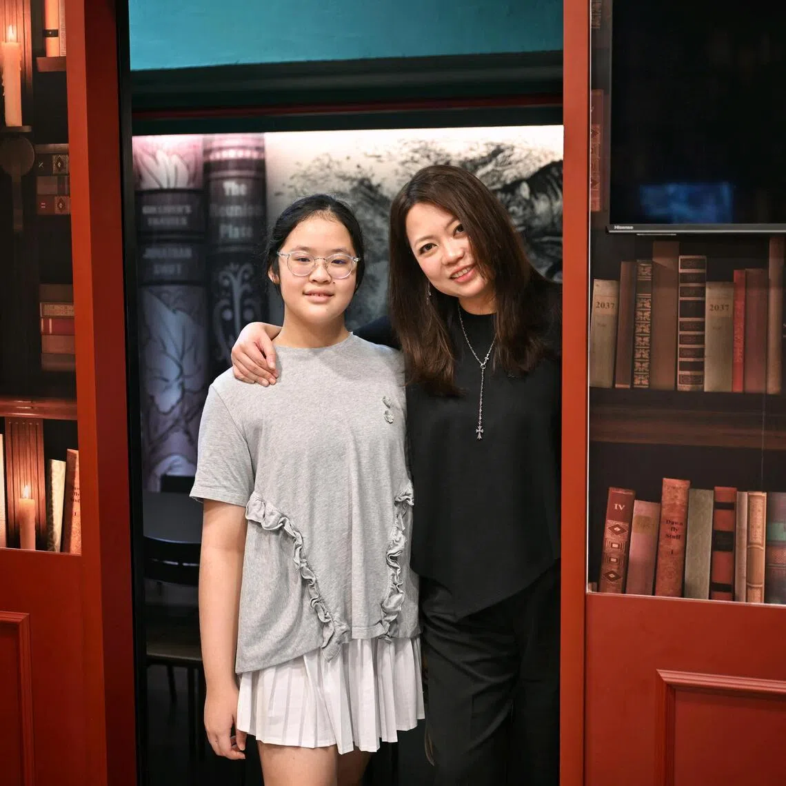 Founder and academic director of Writer’s Guild, Trinity Wang, 44, with her daughter, Emma Hong, 12.