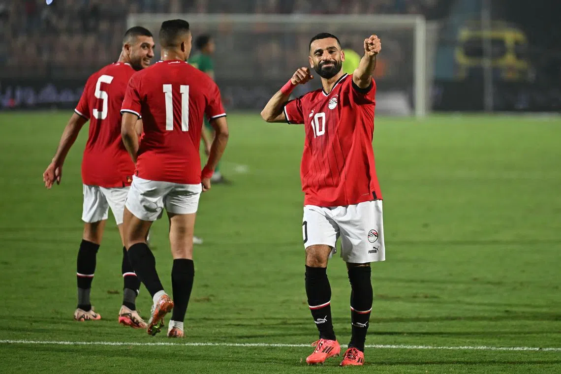 Mohamed Salah of Egypt celebrates scoring during the Africa Cup of Nations qualifier against Mauritania.