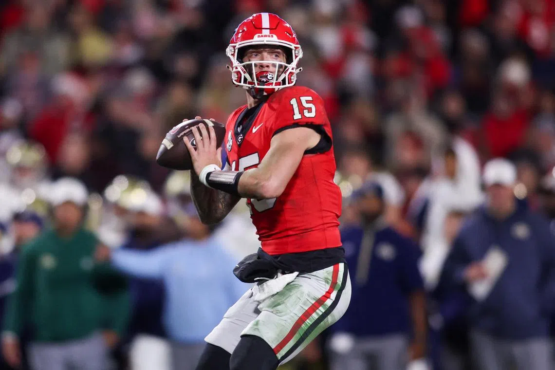 Nov 29, 2024; Athens, Georgia, USA; Georgia Bulldogs quarterback Carson Beck (15) throws a pass against the Georgia Tech Yellow Jackets in the fourth quarter at Sanford Stadium. Mandatory Credit: Brett Davis-Imagn Images